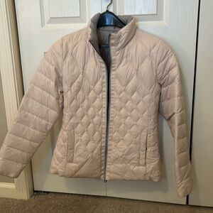 Bass reversible winter jacket. Size medium, no tag. Has travel packing bag